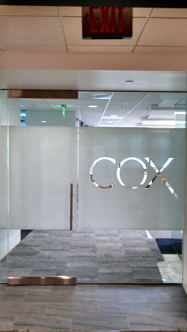 Cox written in glass